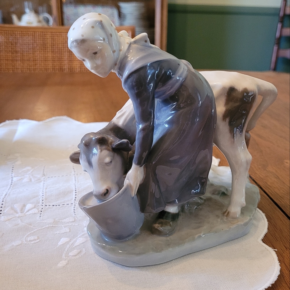 Vintage Royal Copenhagen Porcelain Figurine Girl With Calf 779